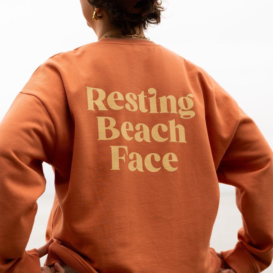 Resting Beach Face Sweatshirt in Sunset