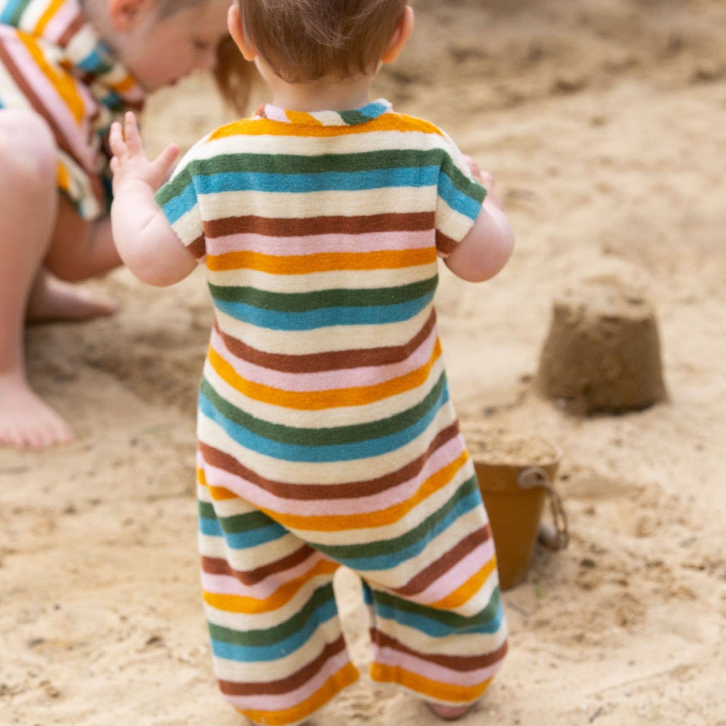 Little Green Radicals - Rainbow Striped Baby Towelling Romper: Rainbow Stripe - ages 2-4