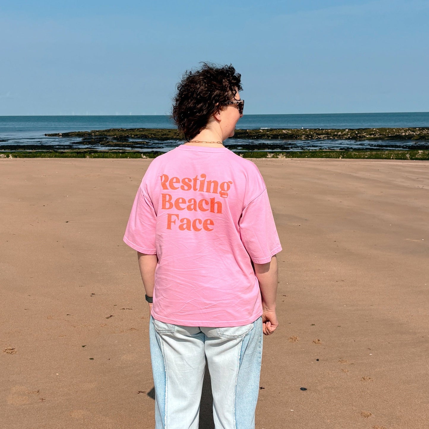 Oversized Pink Resting Beach Face T-Shirt by Harbour & Tide